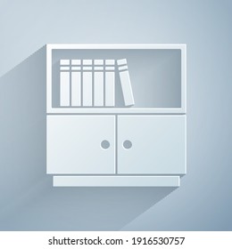 Paper cut Library bookshelf icon isolated on grey background. Paper art style. Vector