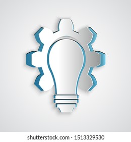 Paper cut Light bulb and gear icon isolated on grey background. Innovation concept. Business idea. Paper art style. Vector Illustration