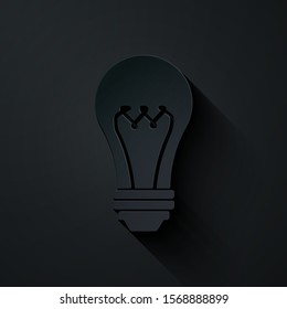 Paper cut Light bulb icon isolated on black background. Energy and idea symbol. Lamp electric. Paper art style. Vector Illustration