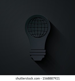 Paper cut Light bulb with inside world globe icon isolated on black background. Planet Earth on the lamp. Global ecology concept. Paper art style. Vector Illustration