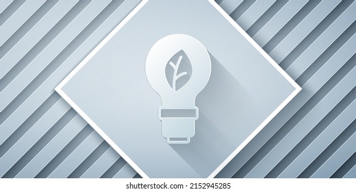 Paper cut Light bulb with leaf icon isolated on grey background. Eco energy concept. Alternative energy concept. Paper art style. Vector