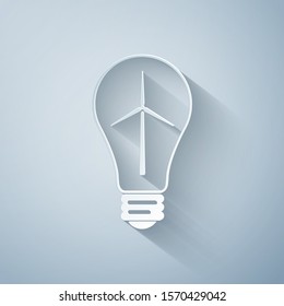 Paper cut Light bulb with wind turbine as idea of eco friendly source of energy icon isolated on grey background. Alternative energy concept. Paper art style. Vector Illustration