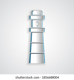 Paper cut Lighthouse icon isolated on grey background. Paper art style. Vector.