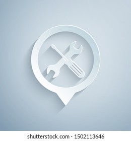 Paper cut Location with crossed screwdriver and wrench tools icon isolated on grey background. Pointer settings symbol. Paper art style. Vector Illustration