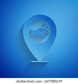 Paper cut Location fishing icon isolated on blue background. Fishing place. Paper art style. Vector Illustration