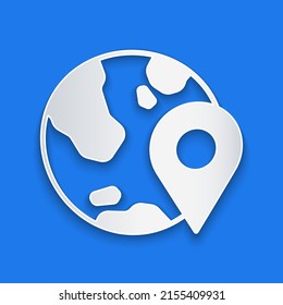 Paper cut Location on the globe icon isolated on blue background. World or Earth sign. Paper art style. Vector