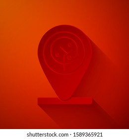 Paper cut Location and tree icon isolated on red background. Paper art style. Vector Illustration