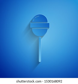 Paper cut Lollipop icon isolated on blue background. Food, delicious symbol. Paper art style. Vector Illustration