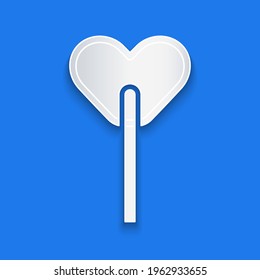 Paper cut Lollipop icon isolated on blue background. Food, delicious symbol. Paper art style. Vector
