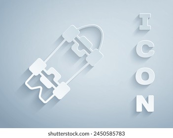 Paper cut Longboard or skateboard cruiser icon isolated on grey background. Extreme sport. Sport equipment. Paper art style. Vector