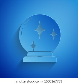 Paper cut Magic ball icon isolated on blue background. Crystal ball. Paper art style. Vector Illustration