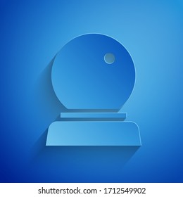Paper cut Magic ball icon isolated on blue background. Crystal ball. Paper art style. Vector Illustration