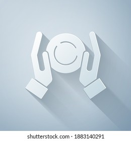 Paper cut Magic ball on hand icon isolated on grey background. Crystal ball. Paper art style. Vector