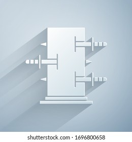Paper cut Magic box, trunk for magic tricks icon isolated on grey background. Show with knives, piercing the box with swords. Paper art style. Vector Illustration