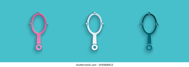 Paper cut Magic hand mirror icon isolated on blue background. Paper art style. Vector
