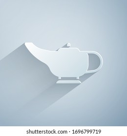 Paper cut Magic lamp or Aladdin lamp icon isolated on grey background. Spiritual lamp for wish. Paper art style. Vector Illustration