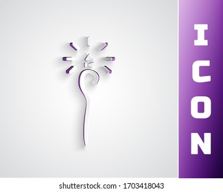 Paper cut Magic staff icon isolated on grey background. Magic wand, scepter, stick, rod. Paper art style. Vector Illustration