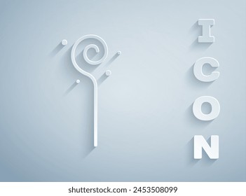 Paper cut Magic staff icon isolated on grey background. Magic wand, scepter, stick, rod. Paper art style. Vector
