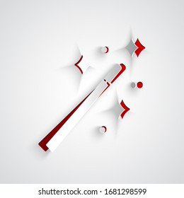 Icono de varita mágica cortada en papel aislado en fondo gris. Accesorio mágico con forma de estrella. Poder mágico. Estilo de arte de papel. Ilustración vectorial