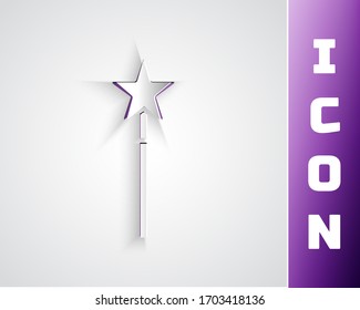 Papier schneidet Zauberstab Symbol einzeln auf grauem Hintergrund. Zaubererzubehör in Sternenform. Magische Kraft. Kunststil aus Papier. Vektorillustration-Illustration