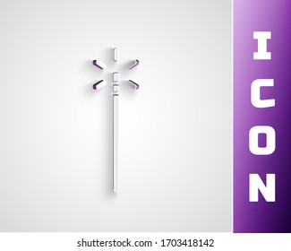 Paper cut Magic wand icon isolated on grey background. Star shape magic accessory. Magical power. Paper art style. Vector Illustration