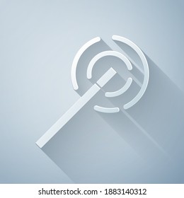 Paper cut Magic wand icon isolated on grey background. Star shape magic accessory. Magical power. Paper art style. Vector