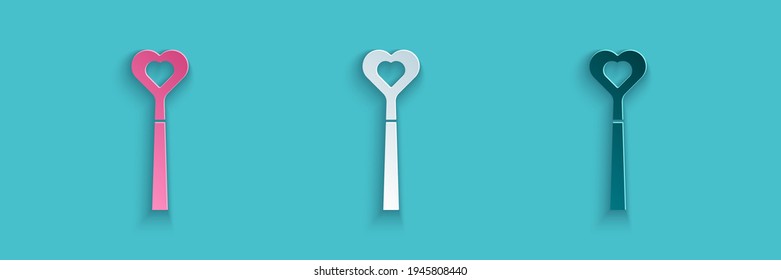 Paper cut Magic wand icon isolated on blue background. Star shape magic accessory. Magical power. Paper art style. Vector
