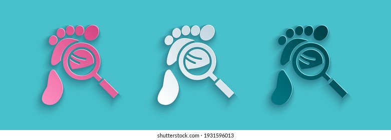 Paper cut Magnifying glass with footsteps icon isolated on blue background. Detective is investigating. To follow in the footsteps. Paper art style. Vector