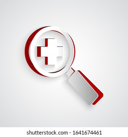 Paper cut Magnifying glass for search medical icon isolated on grey background. Hospital search. Paper art style. Vector Illustration