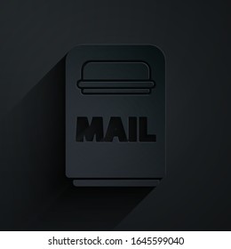 Paper cut Mail box icon isolated on black background. Mailbox icon. Mail postbox on pole with flag. Paper art style. Vector Illustration