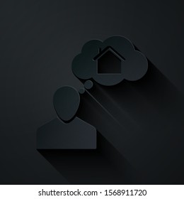 Paper cut Man dreaming about buying a new house icon isolated on black background. Paper art style. Vector Illustration