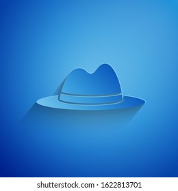 Paper cut Man hat with ribbon icon isolated on blue background. Paper art style. Vector Illustration