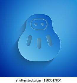 Paper cut Maneki neko cat icon isolated on blue background. Japan lucky charm. Paper art style. Vector Illustration