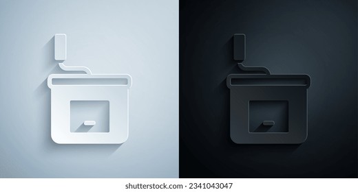 Paper cut Manual coffee grinder icon isolated on grey and black background. Paper art style. Vector