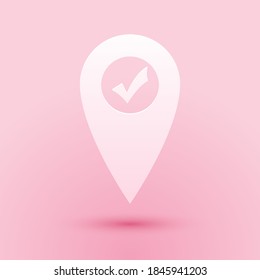 Paper cut Map pointer with check mark icon isolated on pink background. Marker location sign. Tick symbol. For location maps. Sign for navigation. Paper art style. Vector.