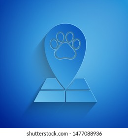 Paper cut Map pointer with veterinary medicine hospital, clinic or pet shop for animals icon isolated on blue background. Veterinarian clinic. Paper art style. Vector Illustration