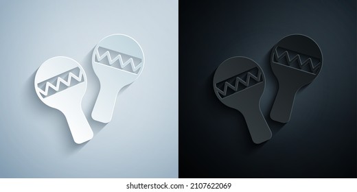 Paper cut Maracas icon isolated on grey and black background. Music maracas instrument mexico. Paper art style. Vector