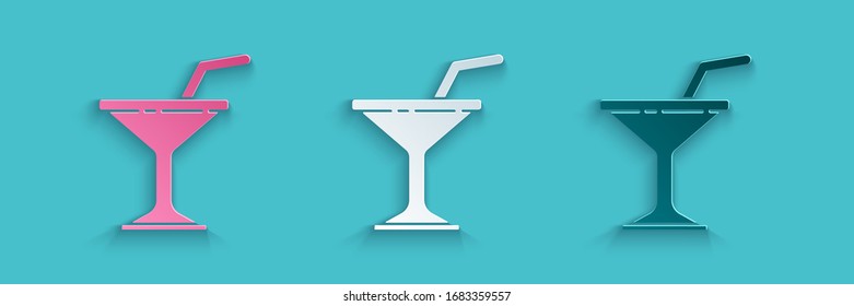 Paper cut Martini glass icon isolated on blue background. Cocktail icon. Wine glass icon. Paper art style. Vector Illustration