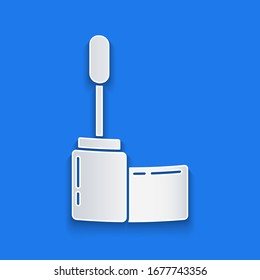 Paper cut Mascara brush icon isolated on blue background. Paper art style. Vector Illustration