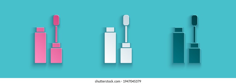 Paper cut Mascara brush icon isolated on blue background. Paper art style. Vector