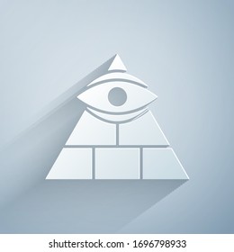 Paper cut Masons symbol All-seeing eye of God icon isolated on grey background. The eye of Providence in the triangle. Paper art style. Vector Illustration