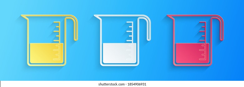 Paper cut Measuring cup to measure dry and liquid food icon isolated on blue background. Plastic graduated beaker with handle. Paper art style. Vector.