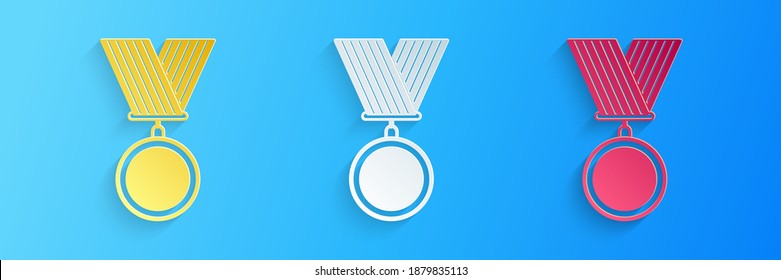 Paper cut Medal icon isolated on blue background. Winner symbol. Paper art style. Vector.