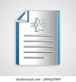 Paper cut Medical certificate for travel with dog or cat icon isolated on grey background. Document for pet. Dog or cat paw print. Paper art style. Vector Illustration