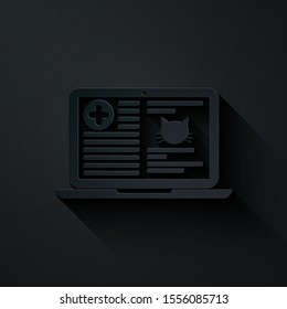Paper cut Medical clinical record cat on laptop icon isolated on black background. Health insurance form. Prescription, medical check marks report. Paper art style. Vector Illustration