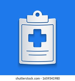 Paper cut Medical clipboard with clinical record icon isolated on blue background. Health insurance form. Prescription, medical check marks report. Paper art style. Vector Illustration