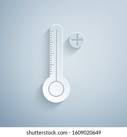 Paper cut Medical digital thermometer for medical examination icon isolated on grey background. Paper art style. Vector Illustration