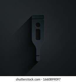 Paper cut Medical digital thermometer for medical examination icon isolated on black background. Paper art style. Vector Illustration