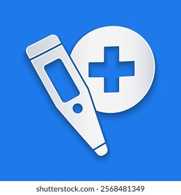 Paper cut Medical digital thermometer for medical examination icon isolated on blue background. Paper art style. Vector