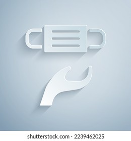 Paper cut Medical protective mask icon isolated on grey background. Paper art style. Vector